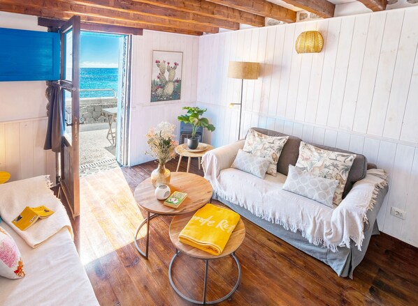 Living area - Eco Fishermans Cottage directly by the sea, quiet harbor/sandy beach, (Arrieta)