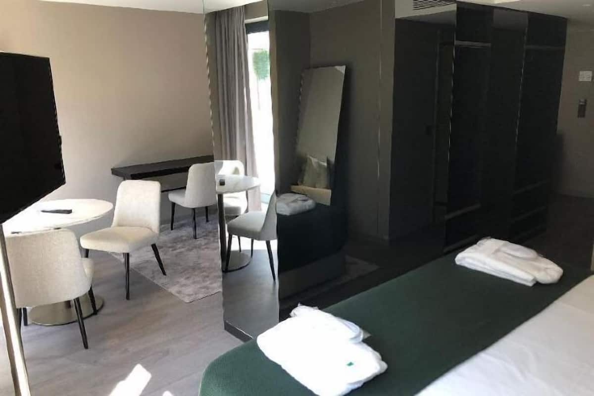 Premium bedding, memory foam beds, minibar, in-room safe