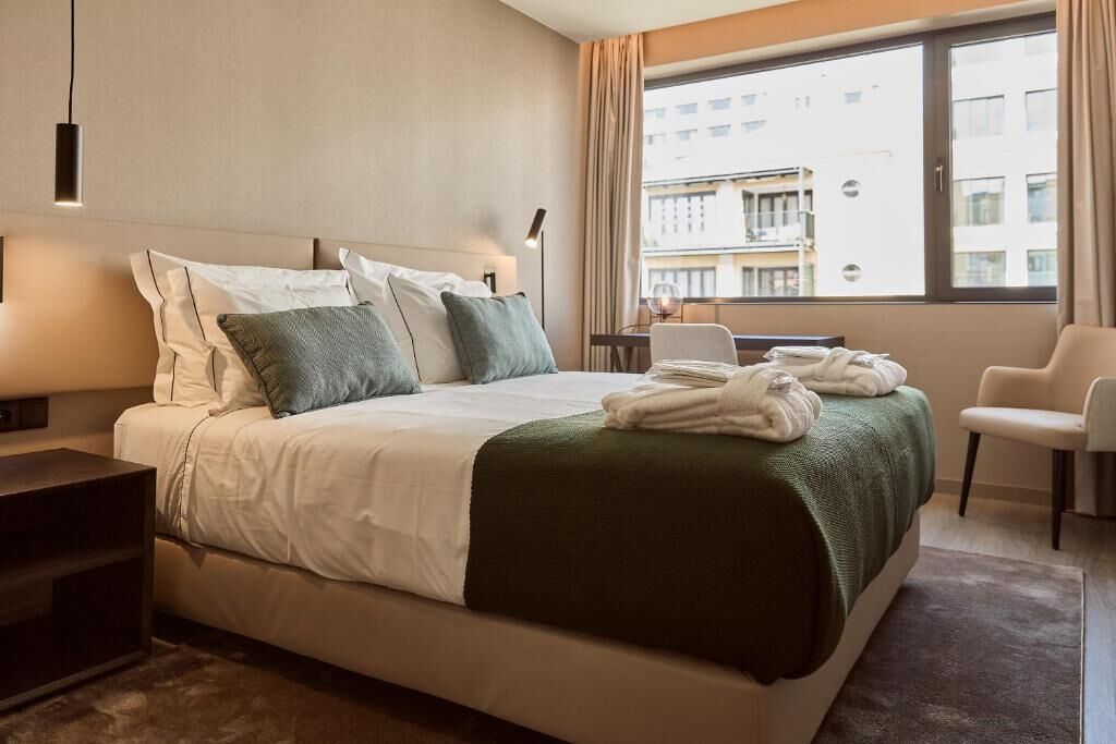 omid classic | premium bedding, memory-foam beds, minibar, in-room safe