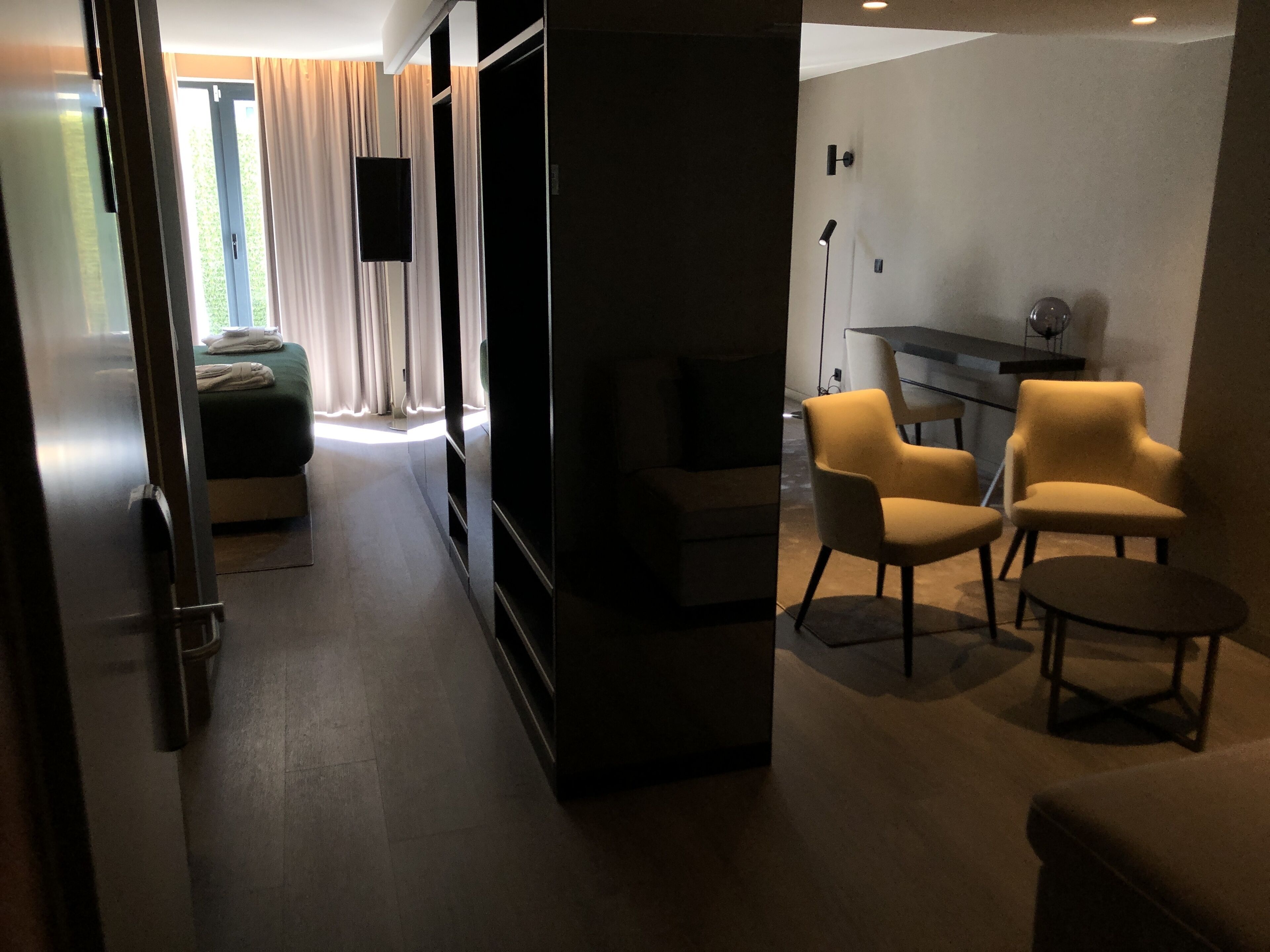 omid exclusive | premium bedding, memory-foam beds, minibar, in-room safe