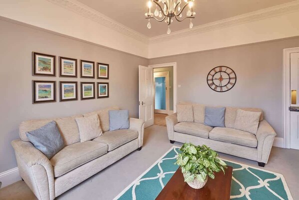 TV, fireplace, books, offices