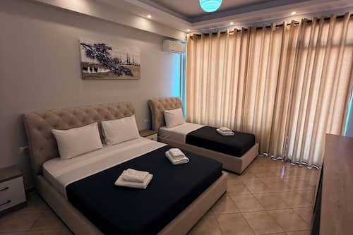 Deluxe Triple Room | Blackout curtains, iron/ironing board, free cots/infant beds, free WiFi