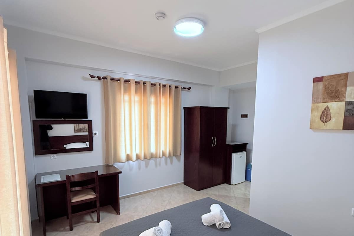 Blackout curtains, iron/ironing board (on request)