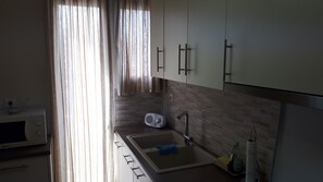 Fridge, microwave, oven, coffee/tea maker - Cute and Cozy Apartment (Kesariani)