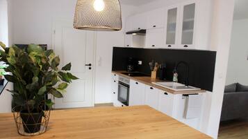 Réfrigérateur, four, plaque de cuisson, lave-vaisselle