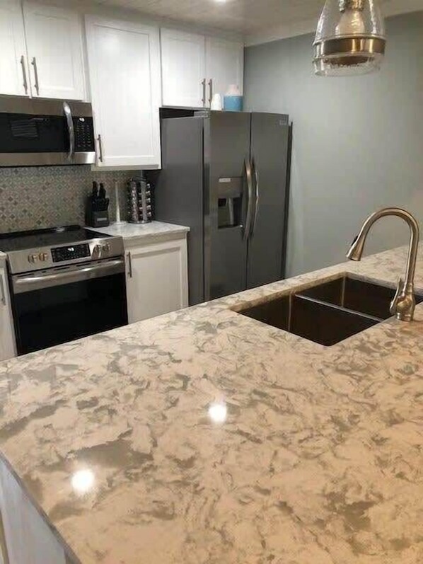 Fridge, microwave, oven, stovetop - Island Dunes-Unit 1005 - One block from beach (Port Aransas)