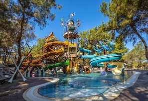 Enjoy thrilling water slides and play structures amidst lush surroundings.