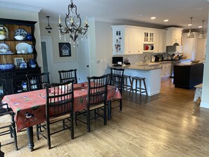 Enjoy meals and snacks in the spacious kitchen with a central island and ample seating.