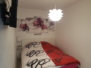 2 habitaciones, tabla de planchar con plancha y wifi gratis 