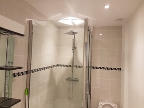 Shower, hair dryer, towels, soap