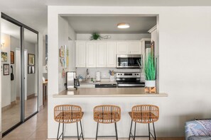 Fridge, microwave, oven, stovetop - Panoramic Ocean Views, 150 Feet from Kamaole I Beach, Rooftop Deck, AC (Kihei)