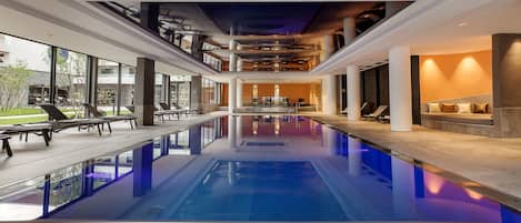 Indoor pool, pool umbrellas, sun loungers