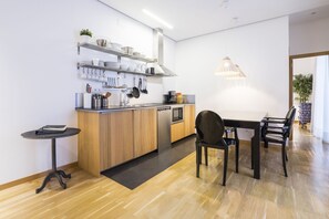 Fridge, microwave, coffee/tea maker, high chair