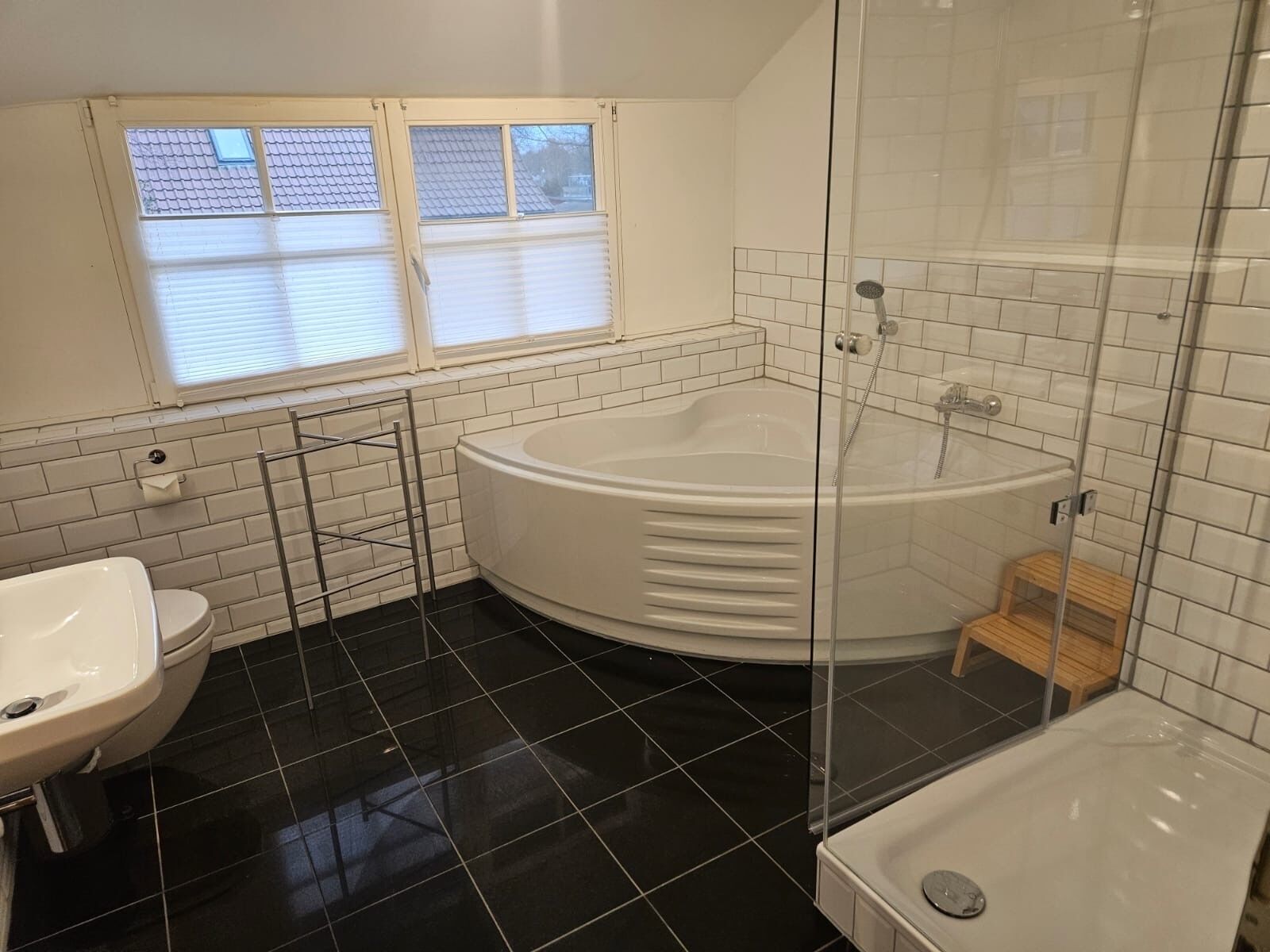 Bathtub, hair dryer, towels, soap