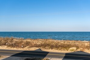 A coastal road with a clear view of the ocean. - Surf's Up: Semi-Oceanfront, Hot Tub, Awesome Views (Kitty Hawk)