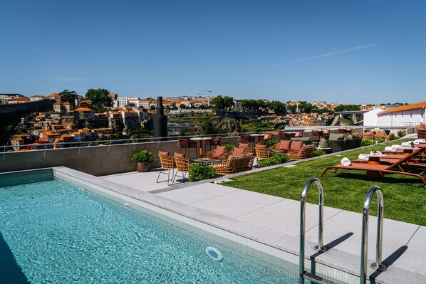 Seasonal outdoor pool, pool umbrellas, sun loungers