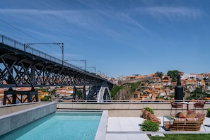 Seasonal outdoor pool, pool umbrellas, sun loungers
