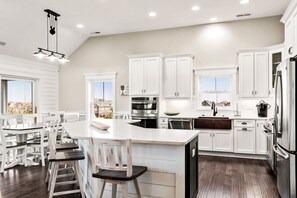 Fridge, microwave, oven, stovetop - Sound Living: Exquisite Canal-front home, Infinity Pool, Hot Tub, Elevator (Nags Head)