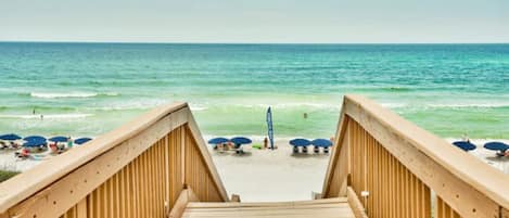 On the beach, sun-loungers, beach towels