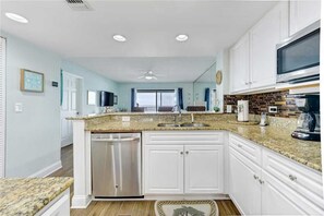 Condo, Multiple Beds, Balcony, Ocean View | Private kitchen | Fridge, microwave, stovetop, dishwasher