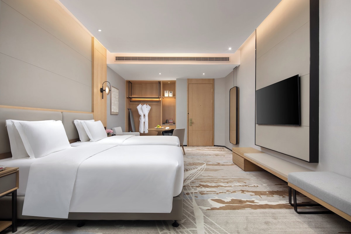 Literie de qualité supérieure, matelas mémoire de forme, minibar