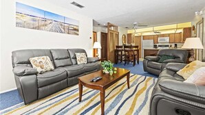 House, 2 Queen Beds, Patio, Garden View | Living room | TV - Turtle Crawl 2, 2 Bedrooms, Ground Floor, Wifi, Sleeps 4 (Fort Myers Beach)