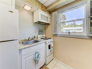 House, Multiple Beds, Patio | Private kitchen | Fridge, microwave, stovetop, dishwasher