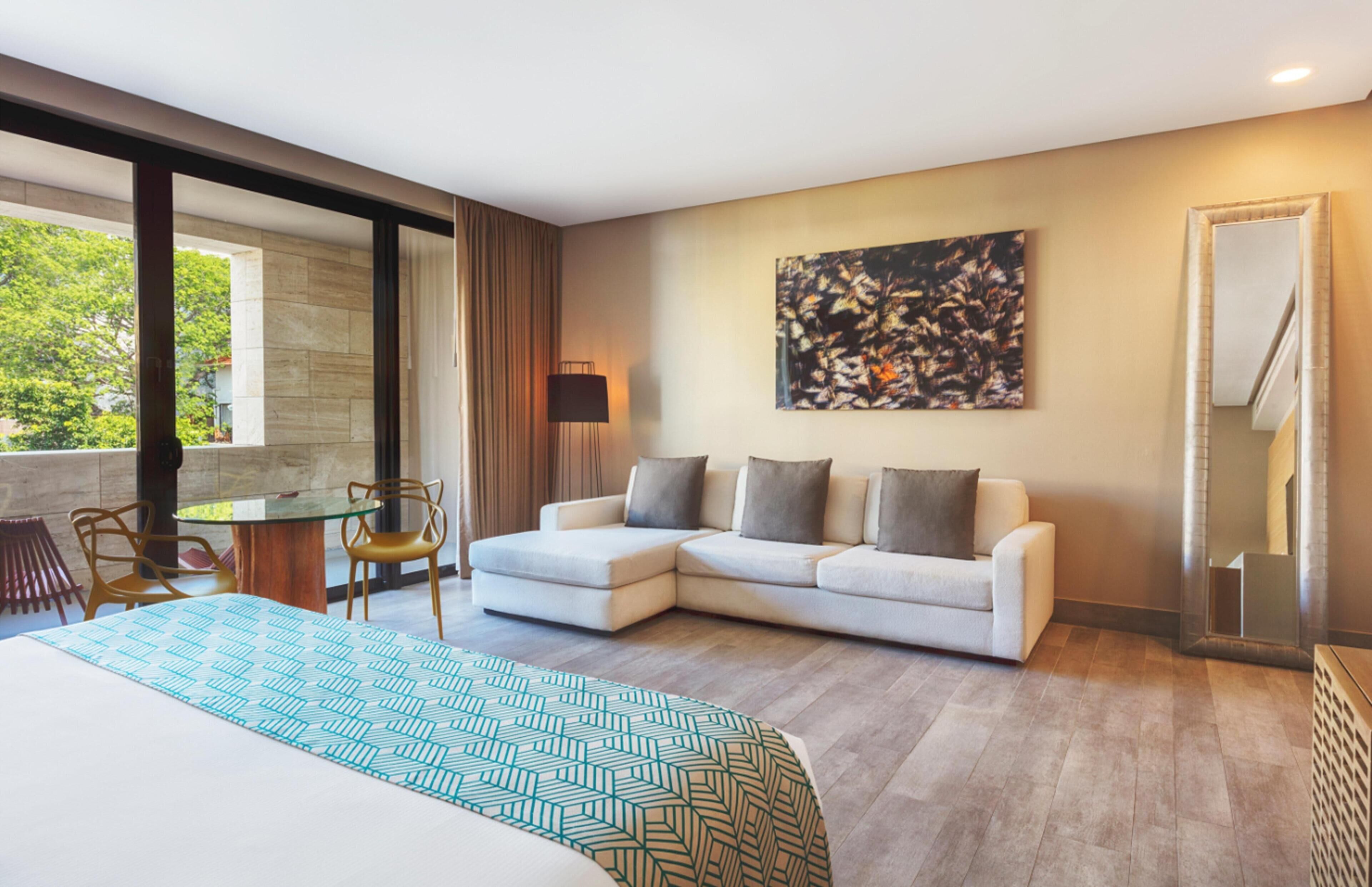 Junior Suite, 1 King Bed | Premium bedding, minibar, in-room safe, individually decorated