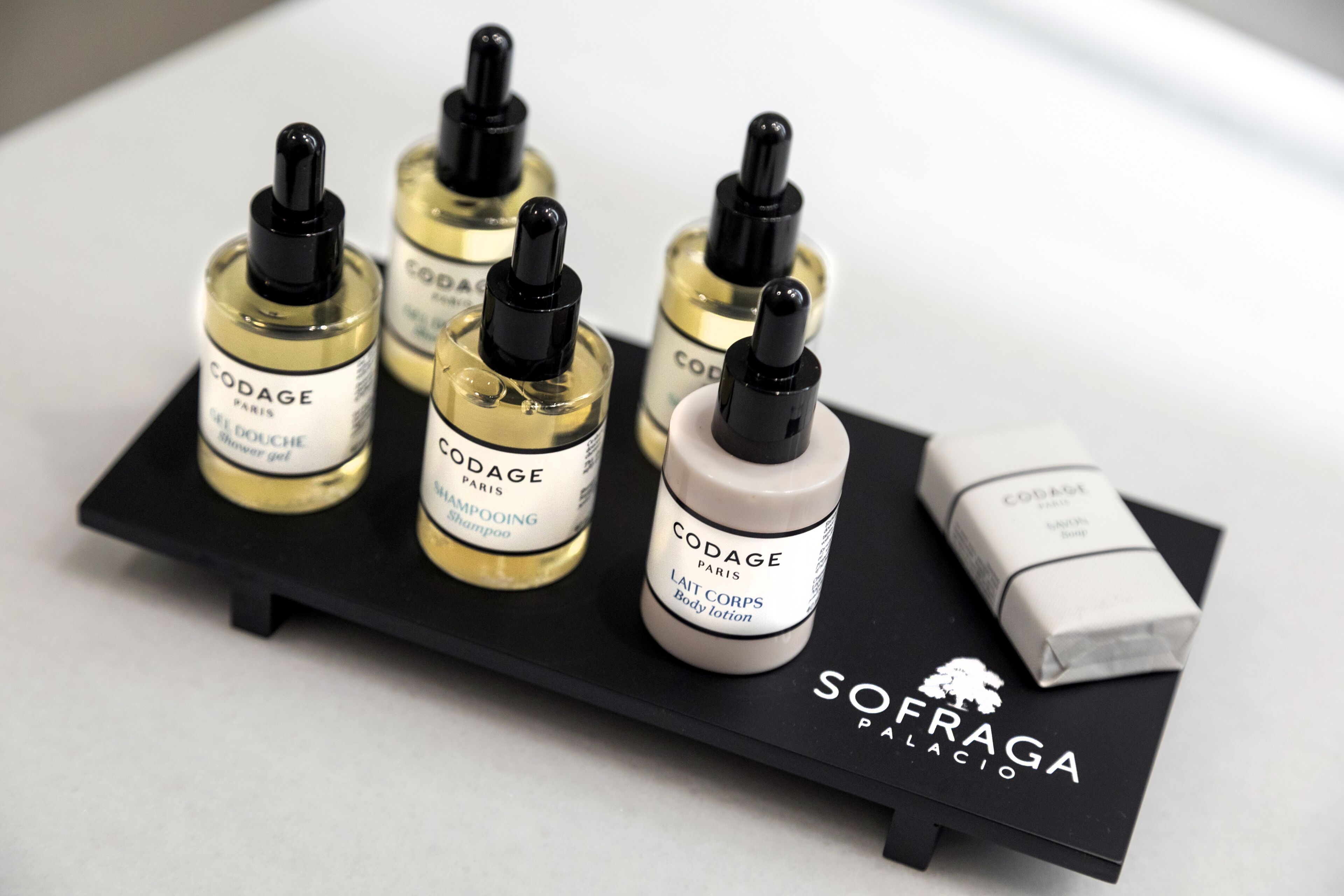 bathroom | shower, rainfall showerhead, designer toiletries, hair dryer