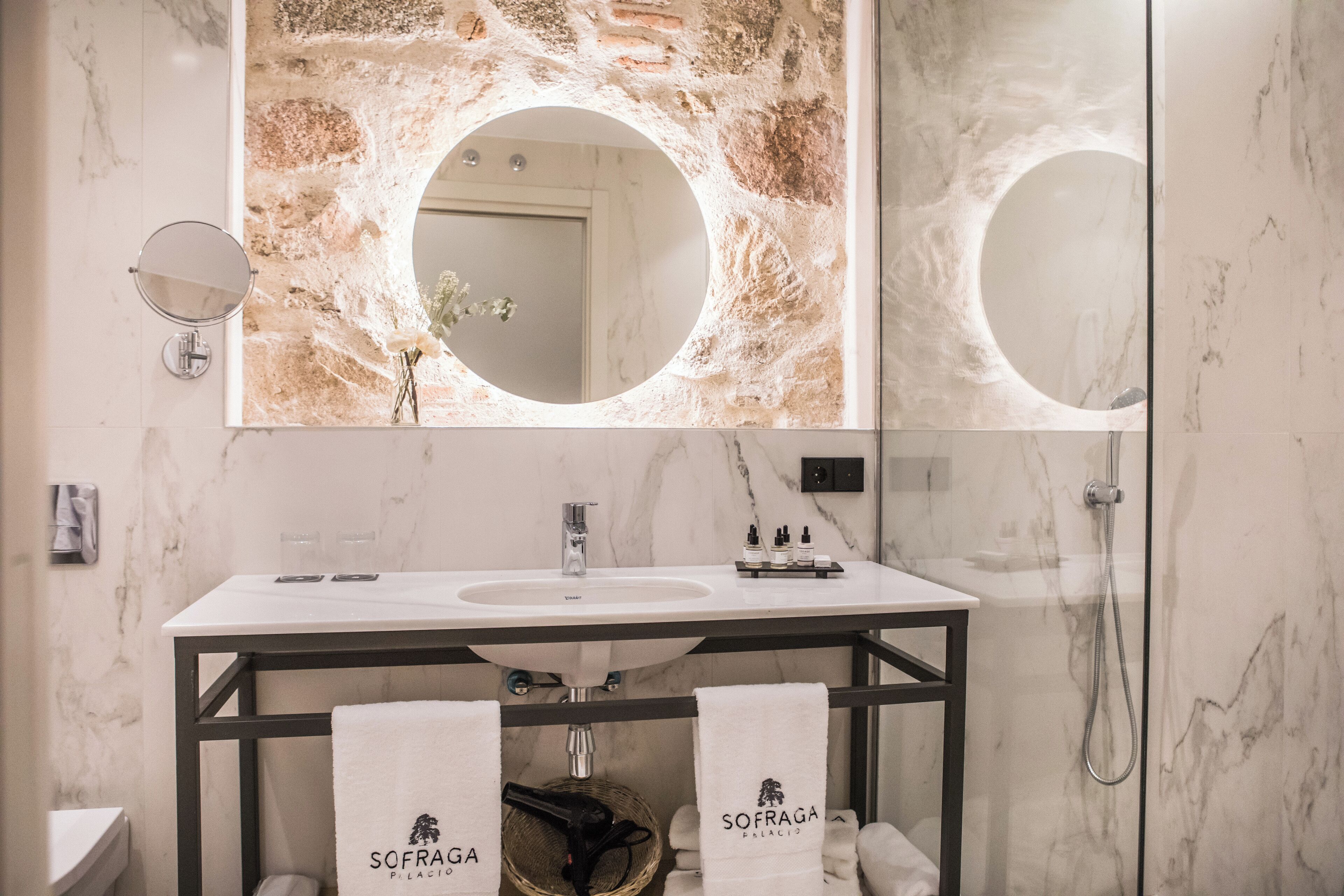 shower, rainfall showerhead, designer toiletries, hair dryer