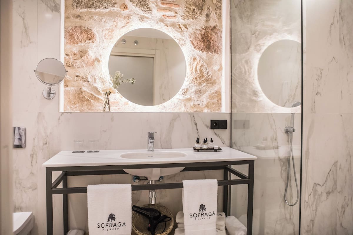 shower, rainfall showerhead, designer toiletries, hair dryer