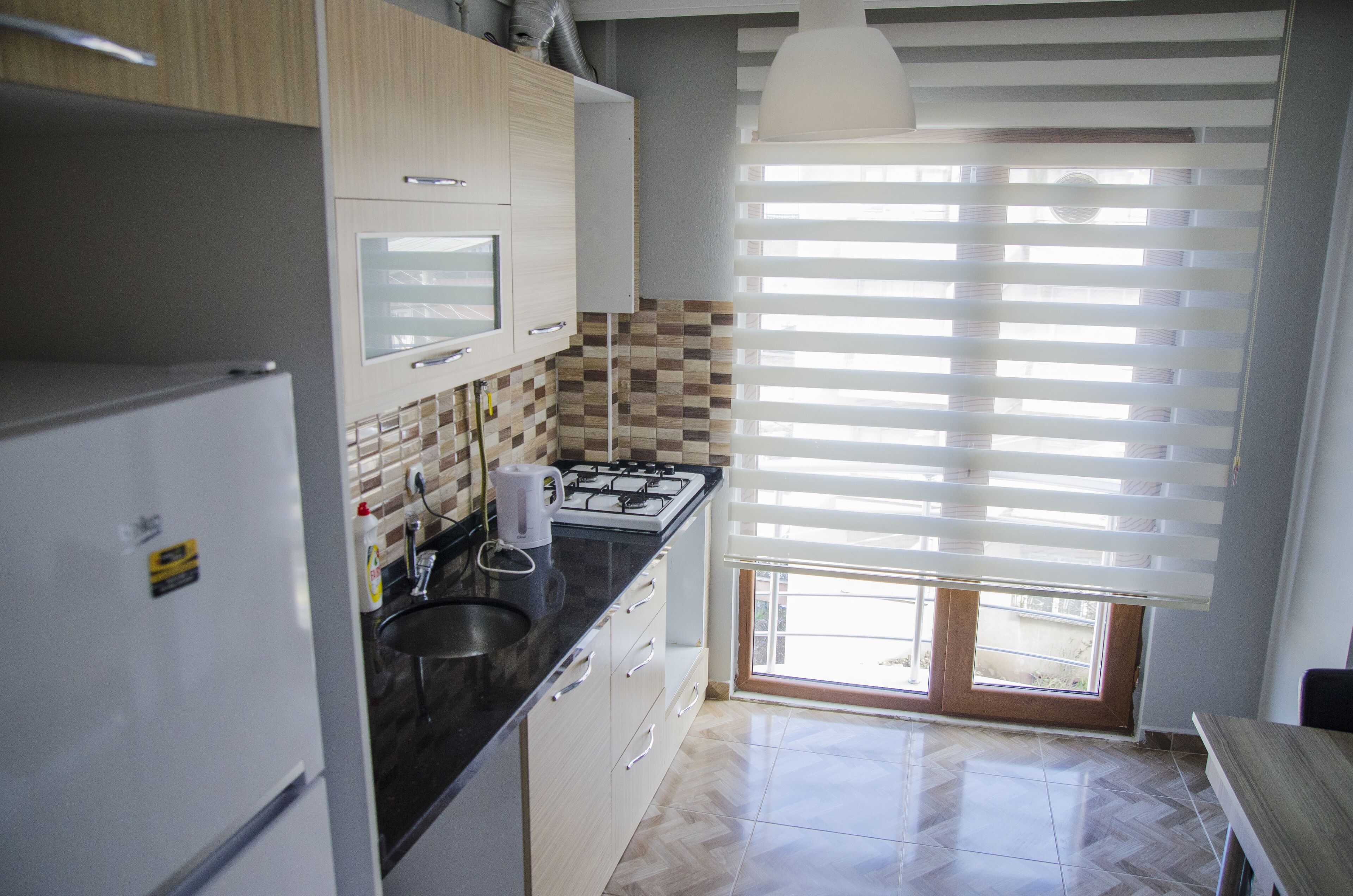 deluxe apartment | private kitchen | fridge, oven, stovetop, eco-friendly cleaning products