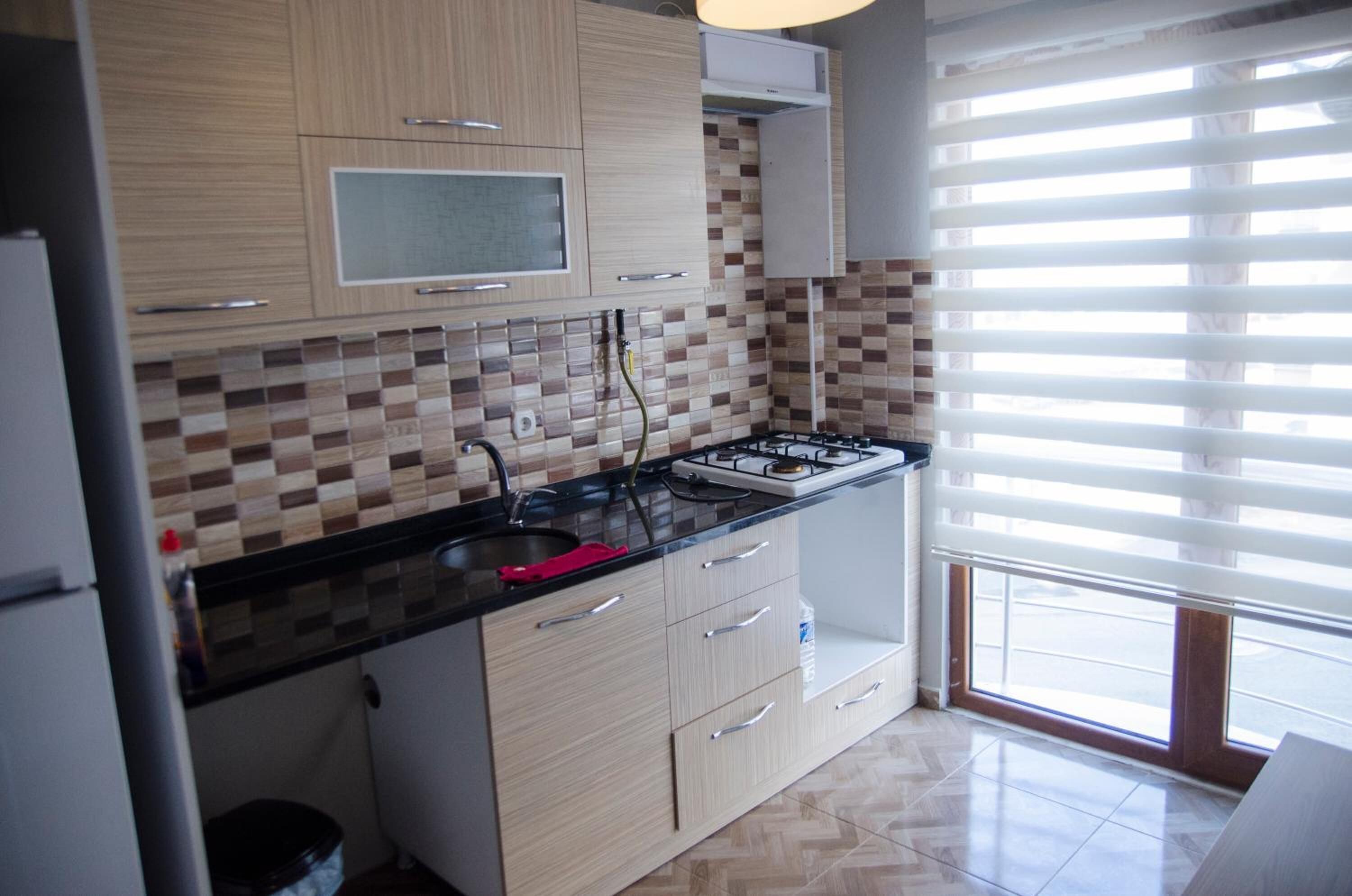 deluxe apartment | private kitchen | fridge, oven, stovetop, eco-friendly cleaning products