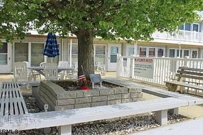 Guests can enjoy communal dining and seating areas outside their rooms.