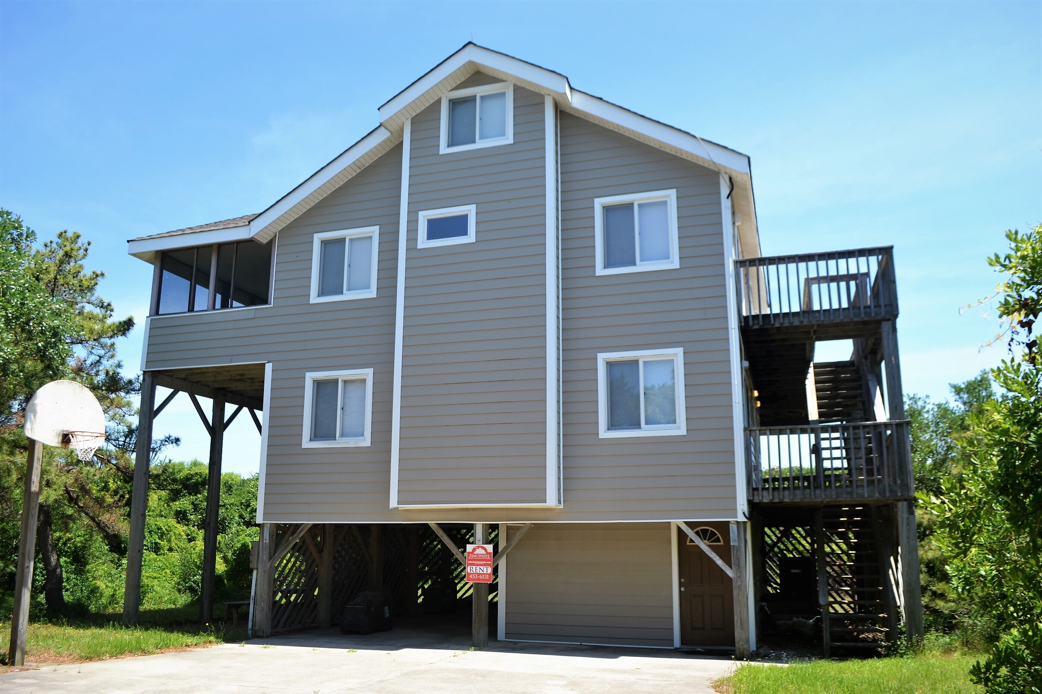 This oceanside home, just 125 yards from the beach, has something for everyone.