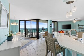 Panoramic Condo, 2 Bedrooms, Ocean View (405 W) | Living area | 32-inch flat-screen TV with cable channels, TV - AquaVista by Book That Condo (Panama City Beach)