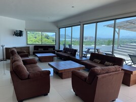 Panoramic Apartment | Living area | 32-inch flat-screen TV with cable channels, TV