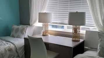 2 bedrooms, desk, iron/ironing board, travel crib