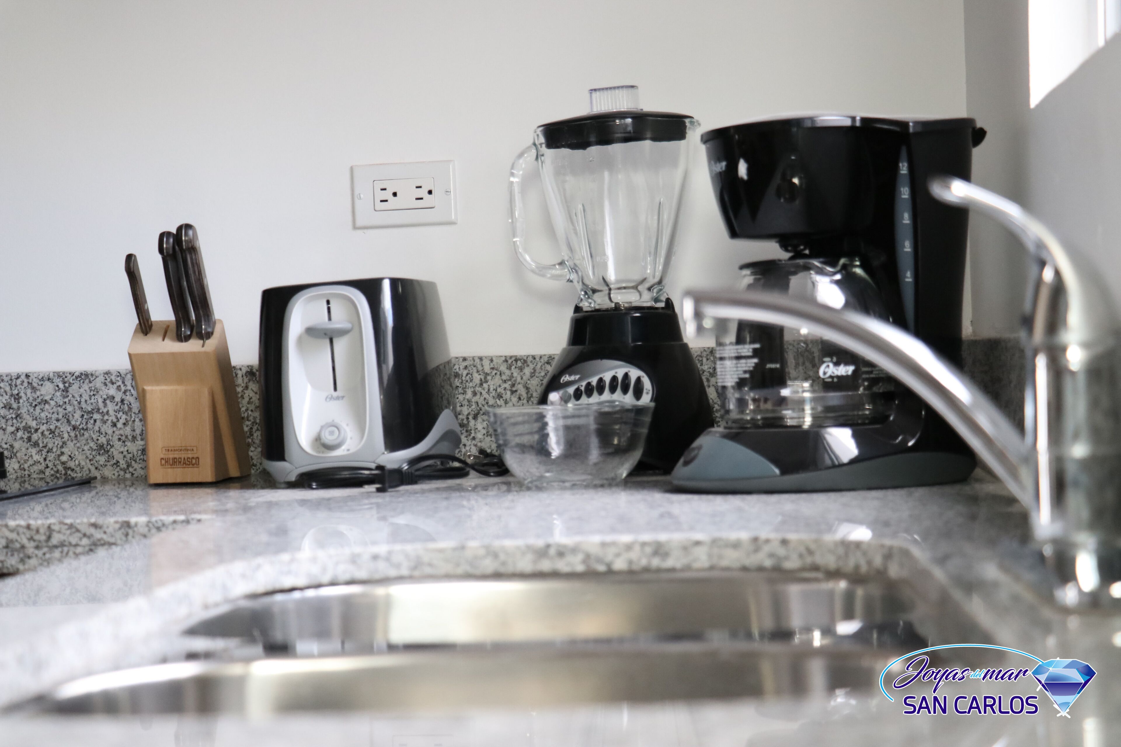 Fridge, microwave, coffee/tea maker, toaster