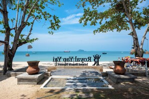 On the beach, white sand, beach shuttle, sun loungers