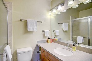 En suite bathroom - Clean, well-lit, and fully stocked with essentials.