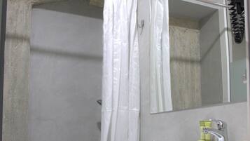 Economy Double Room | Bathroom | Shower, rainfall showerhead, free toiletries, hair dryer