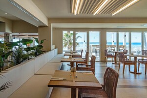 Breakfast, lunch, dinner served; Mediterranean cuisine, beach views 