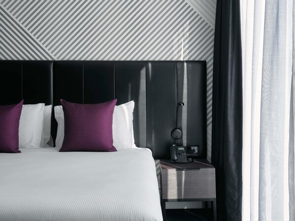 Ropa de cama de alta calidad y minibar
