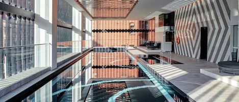 Indoor pool, sun loungers