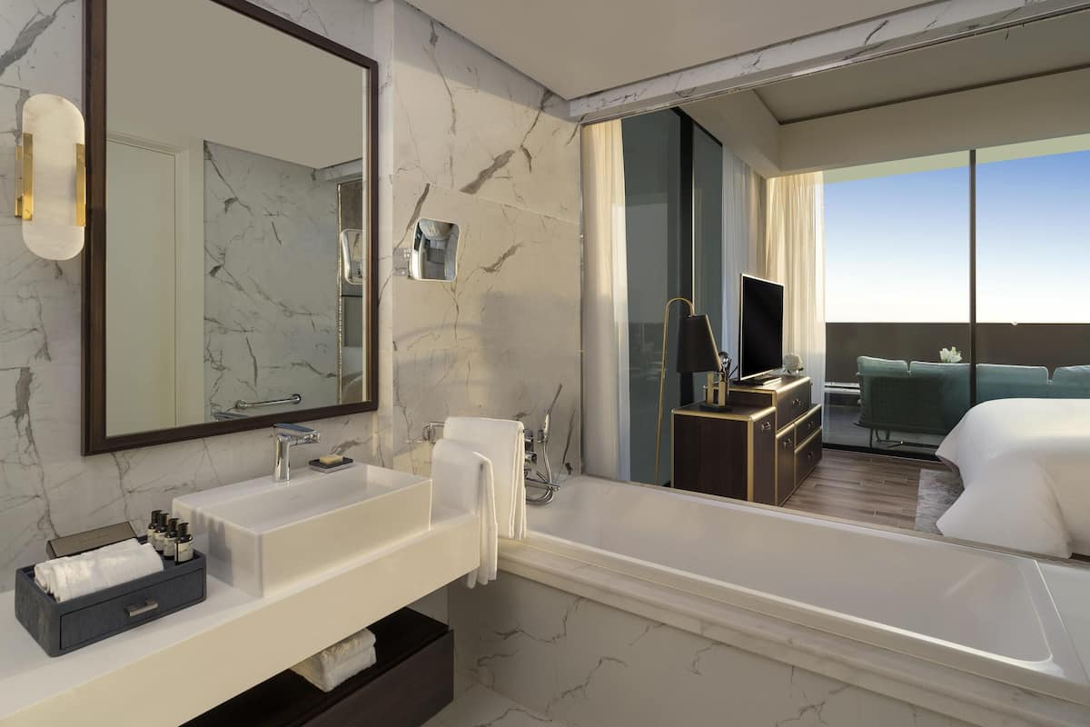 Premium bedding, down duvets, pillow-top beds, minibar