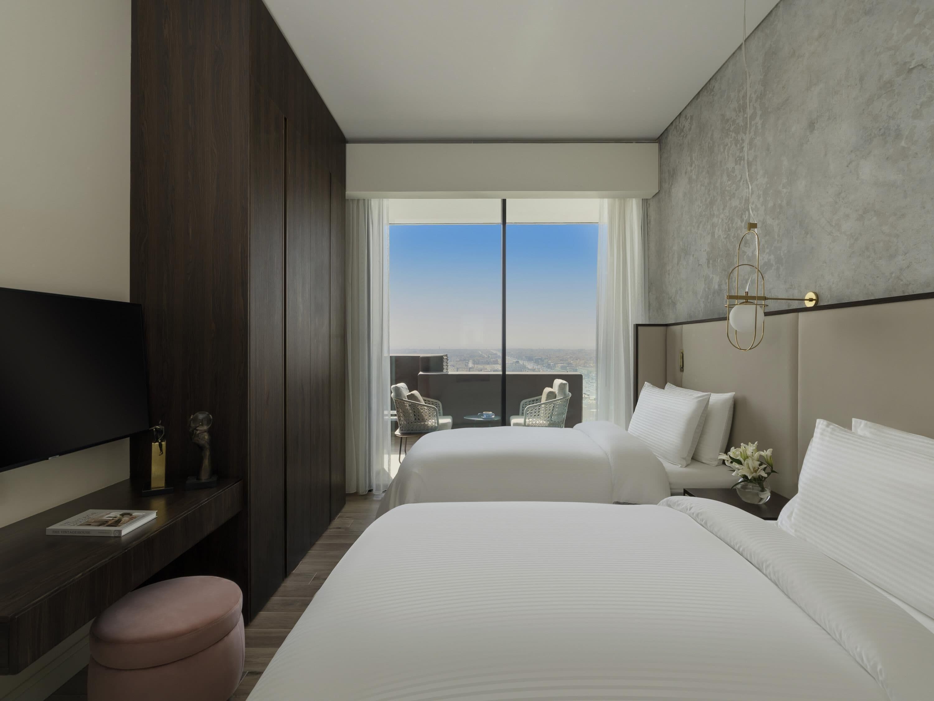 Premium bedding, down comforters, pillowtop beds, minibar