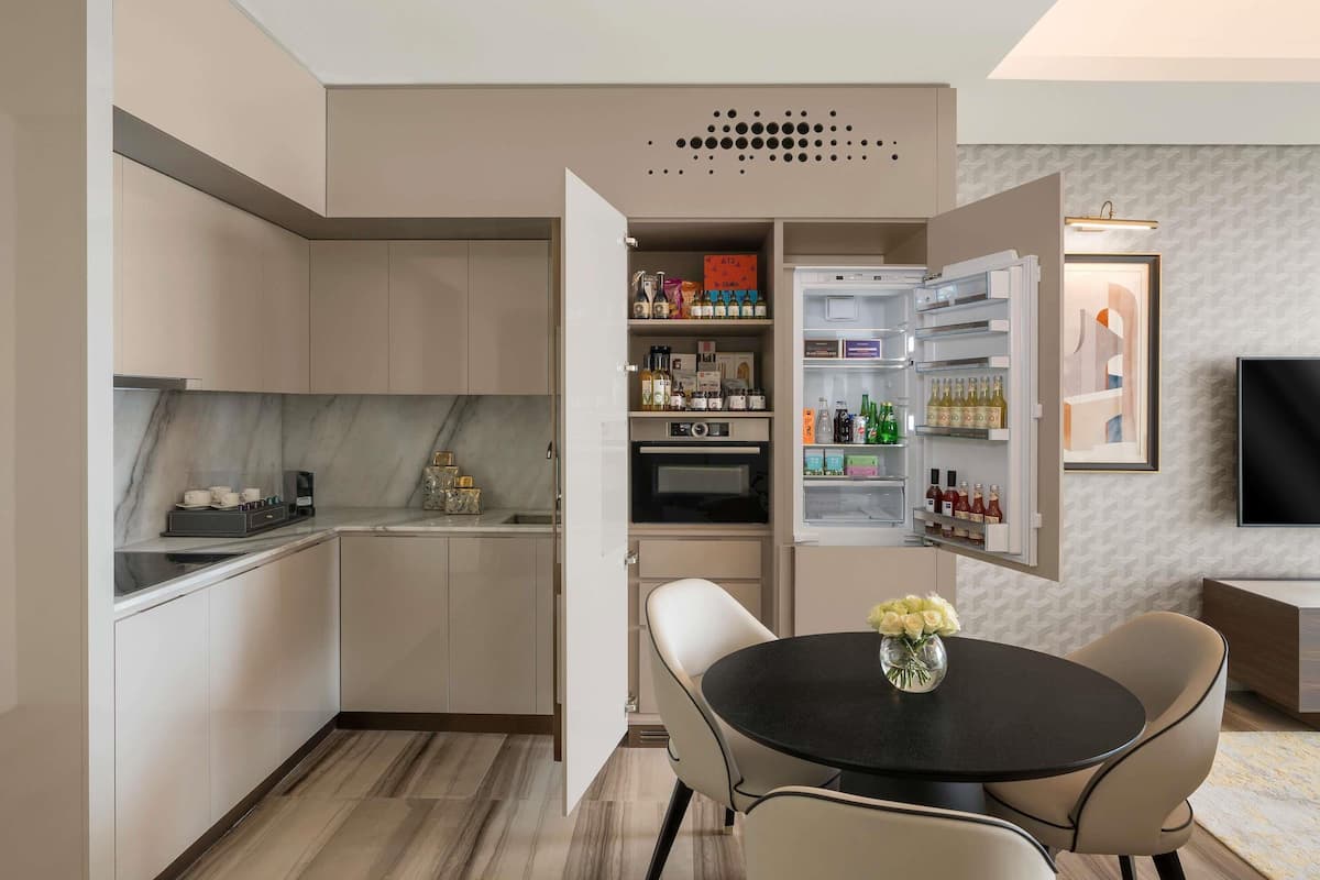 Premium bedding, down comforters, pillowtop beds, minibar