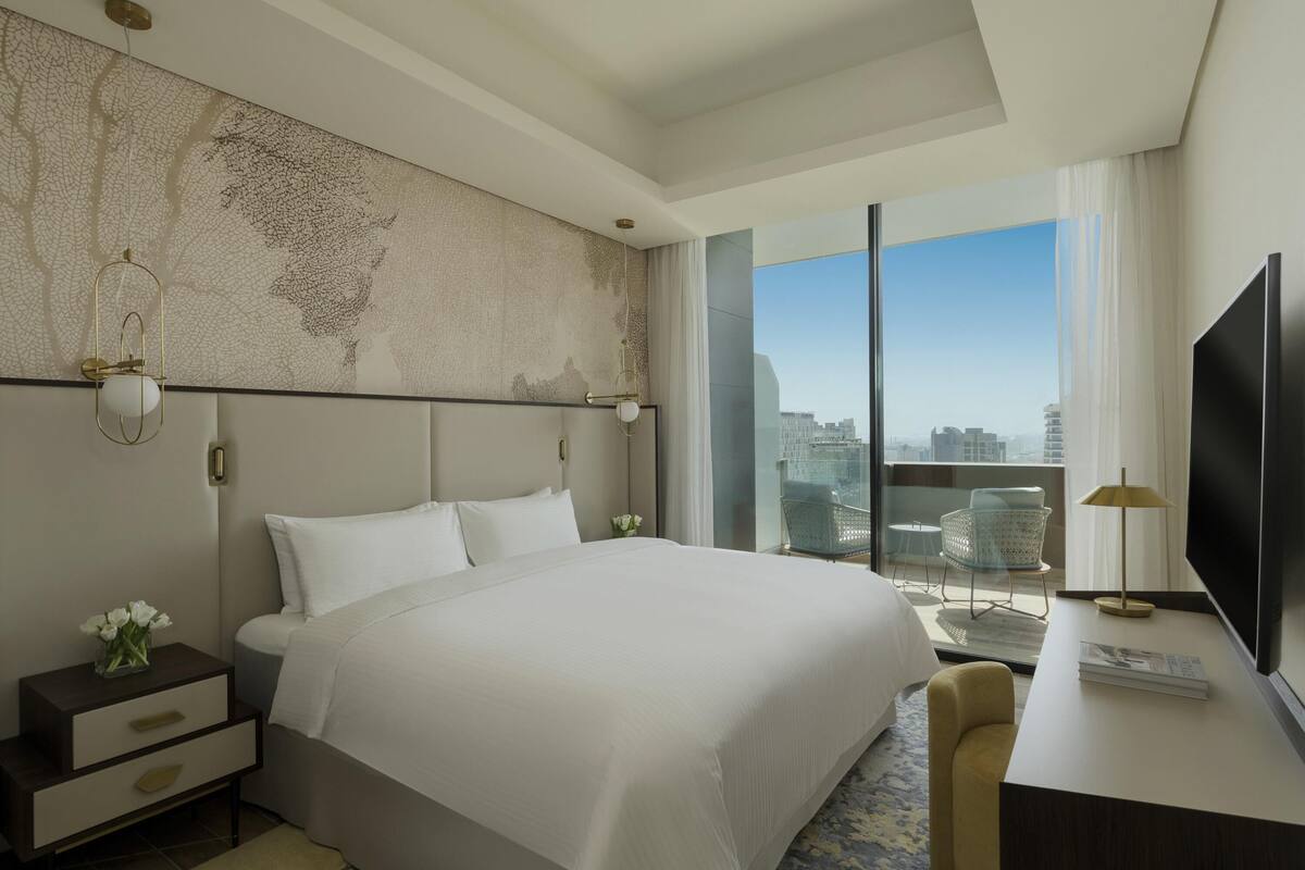 Premium bedding, down comforters, pillowtop beds, minibar