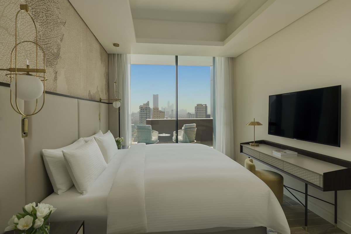 Premium bedding, down comforters, pillowtop beds, minibar